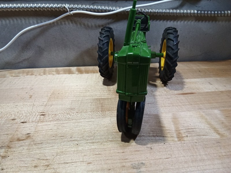 John Deere 50 vintage metal diecast toy tractor rubber tires heavy and solid gallery