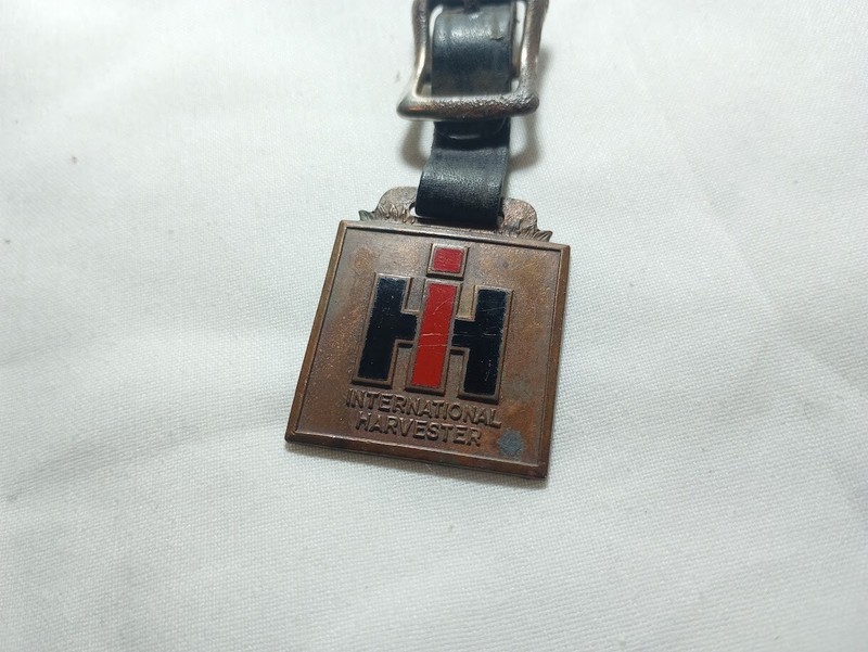 ---Vtg enameled IH logo International Harvester watch fob Green Duck Chicago gallery