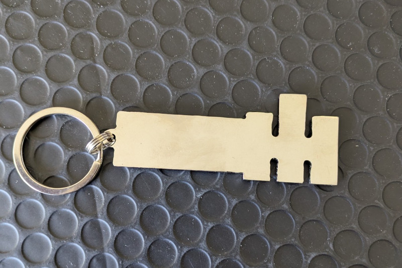 Lot of 2 International Harvester Scout II Keychains One Metal One Rubber gallery