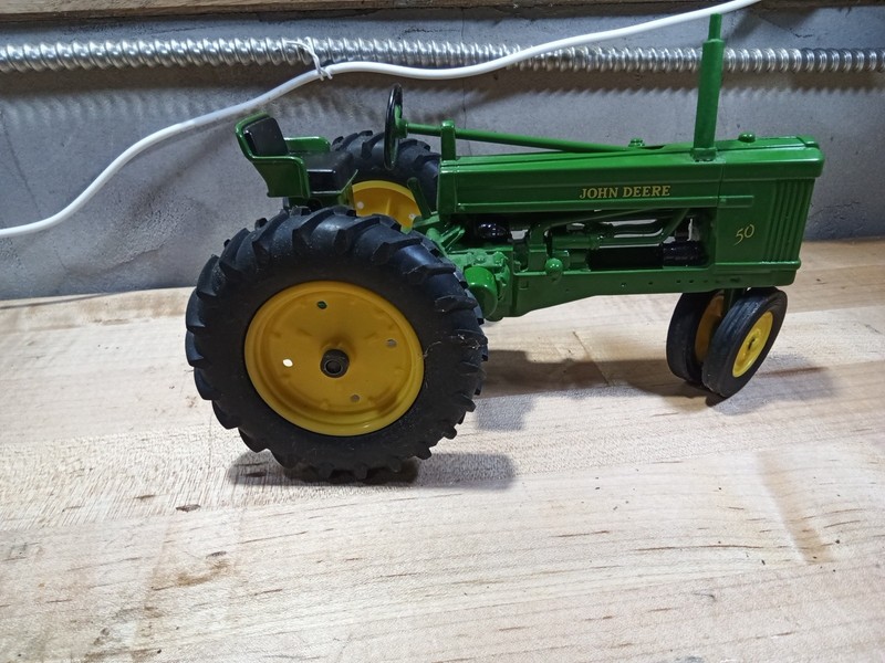 John Deere 50 vintage metal diecast toy tractor rubber tires heavy and solid gallery