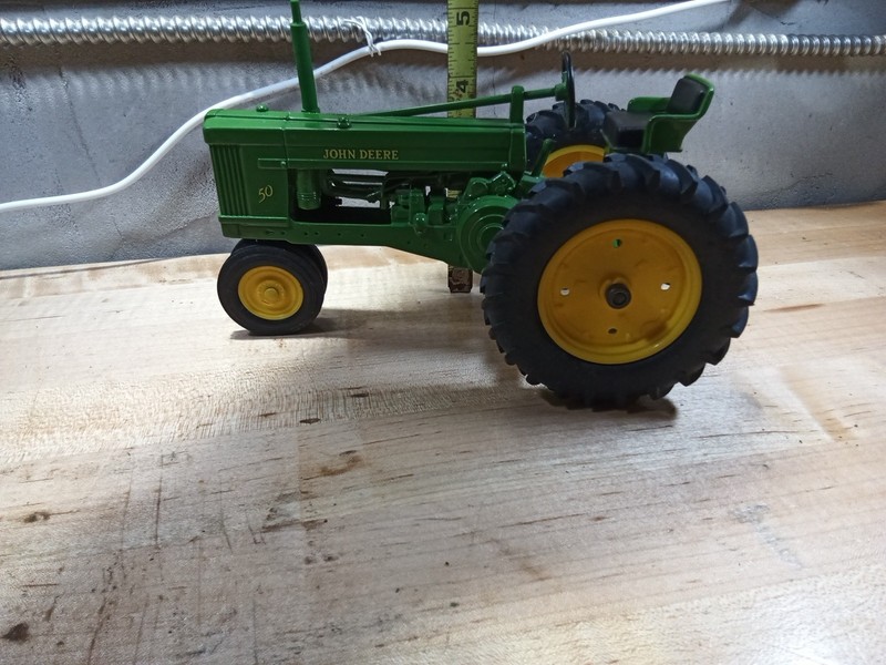 John Deere 50 vintage metal diecast toy tractor rubber tires heavy and solid gallery