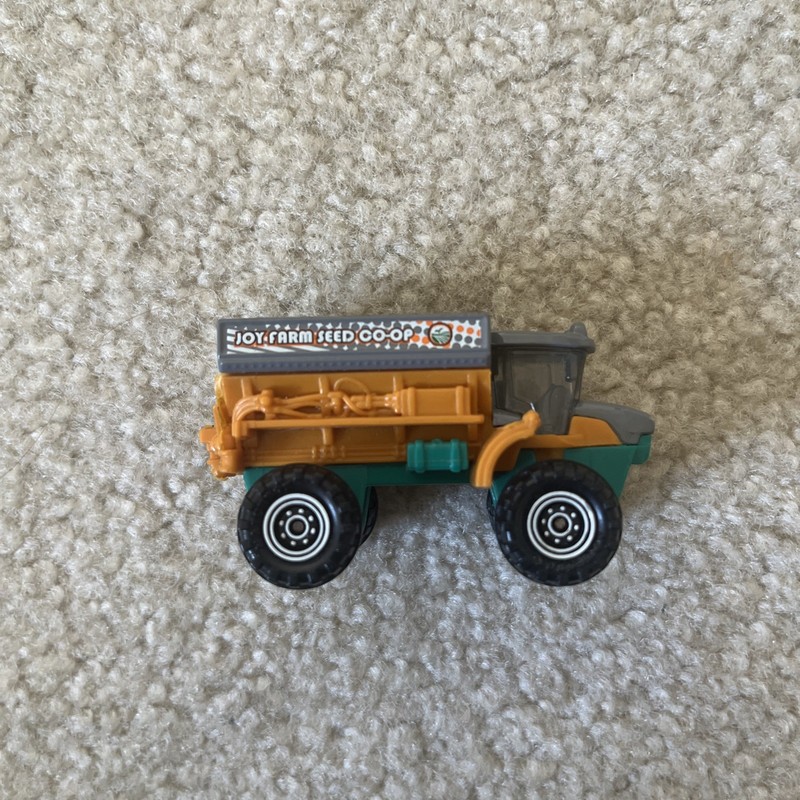 Toy Truck Sowing Machine ©2012 Orange Joy Farm Seed Co-Op Matchbox