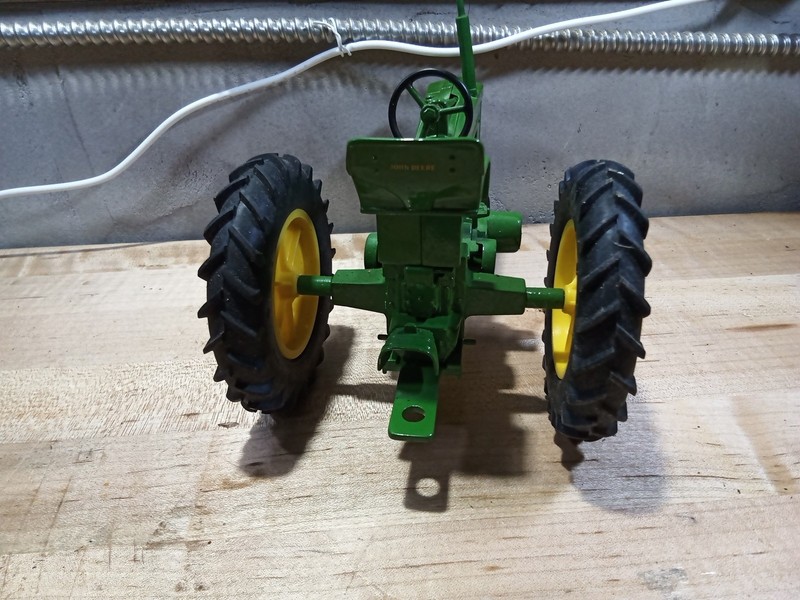 John Deere 50 vintage metal diecast toy tractor rubber tires heavy and solid gallery