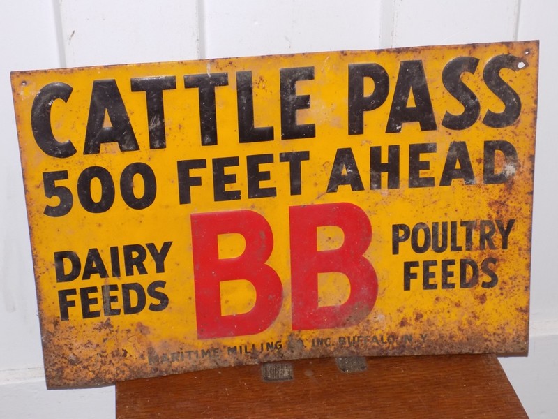 Vintage BB Dairy Poultry Feeds Cattle Pass Metal Sign