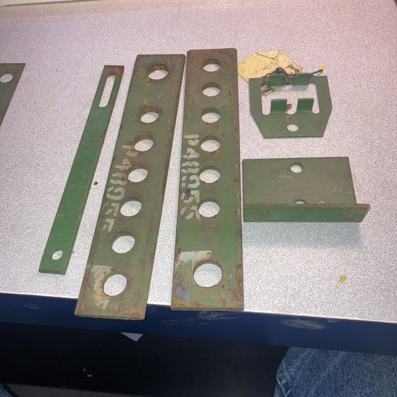 Vintage John Deere assorted brackets