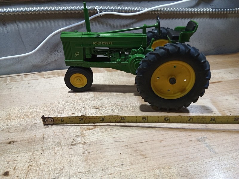 John Deere 50 vintage metal diecast toy tractor rubber tires heavy and solid gallery