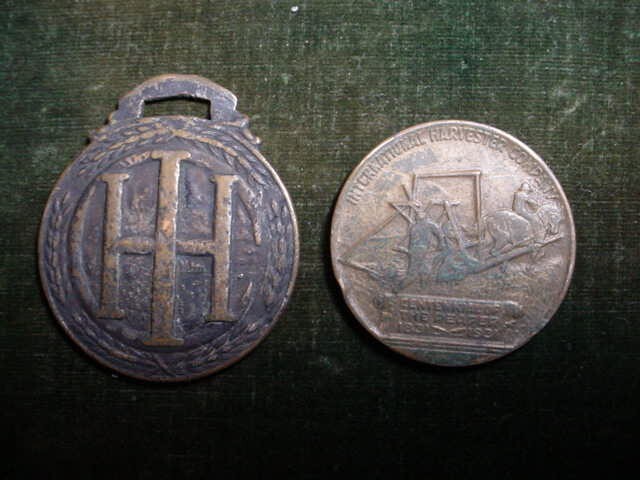 VTG. INTERNATIONAL HARVESTER FOB (NOBLE) & CENTENNIAL OF THE REAPER TOKEN 1931