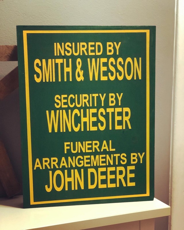 John Deere Warning Sign “Insured by Smith & Wesson Security By Winchester”