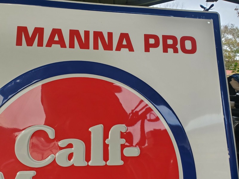 NOS Vintage MANNA PRO CALF MANNA FEED Large Embossed Metal SIGN STOUT MFG USA gallery