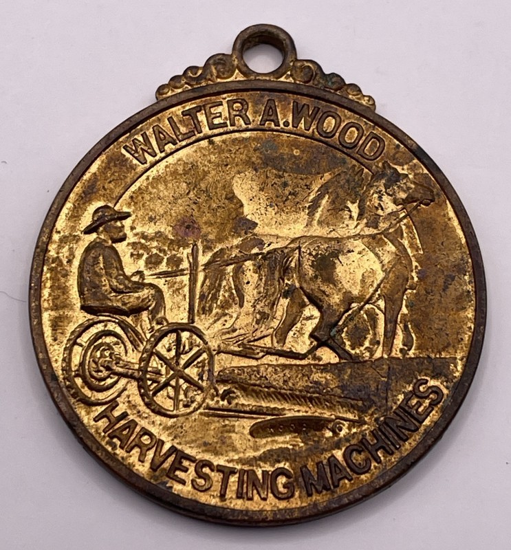 Walter A. Wood Harvesting Machine Company 1909 Medal Coin Keychain gallery