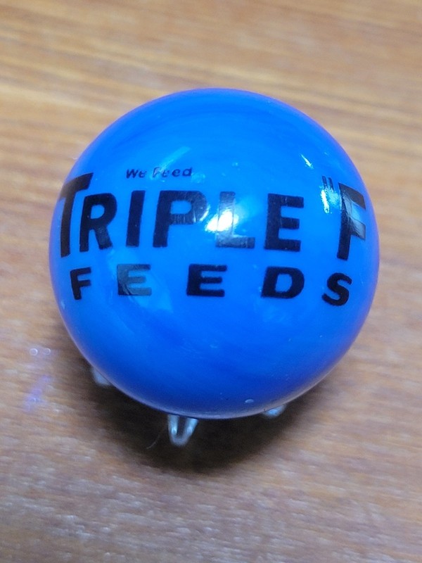 TRIPLE “F” CORN FEED SEED FARMING ADVERTISING MARBLE 1″ SHOOTER SIZE & STAND