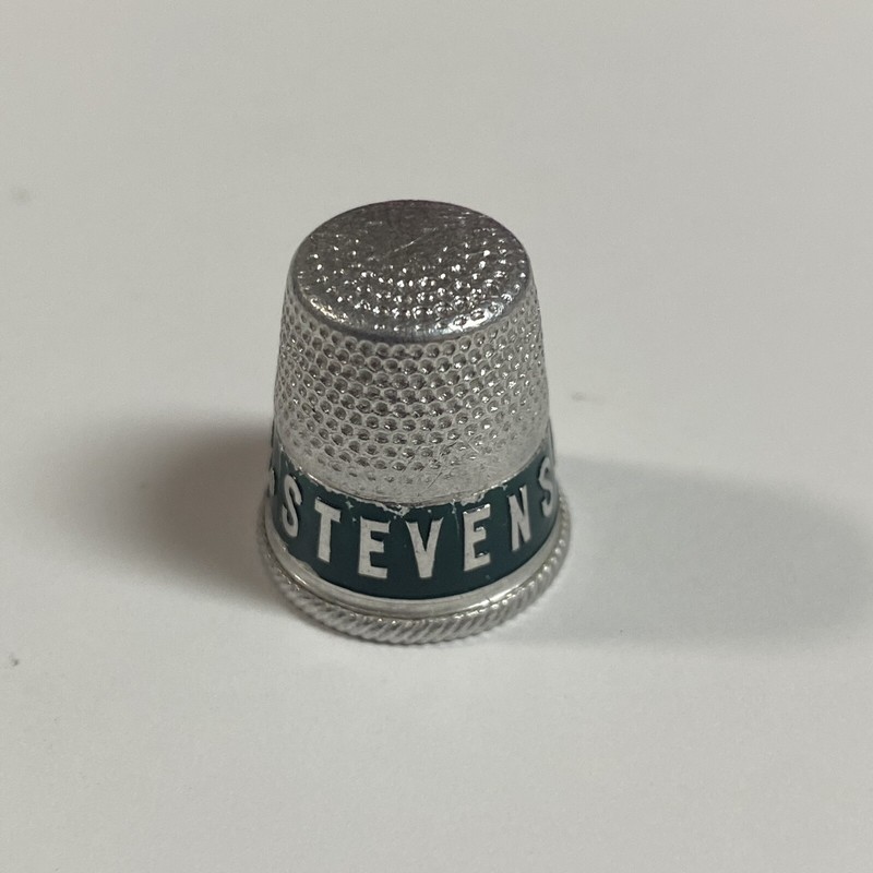 Stevens Insurance Advertising Aluminum Sewing Thimble Green