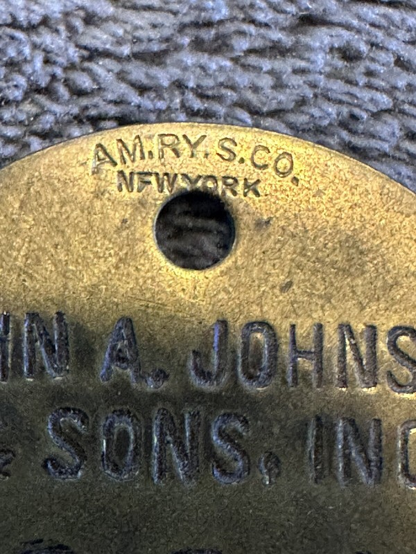 Vintage-JOHNSON & JOHNSON Round BRASS Metal Tag #691 gallery