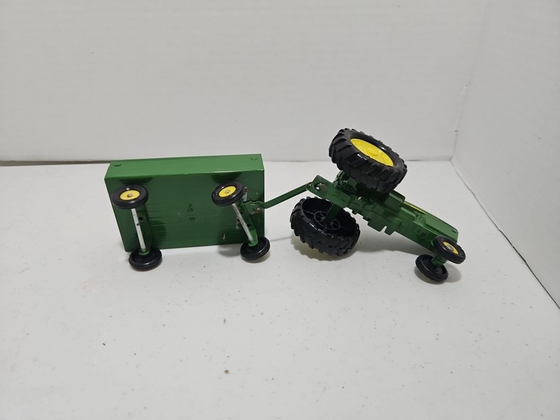 Vintage Ertl John Deere tractor and Lift Gate Wagon gallery