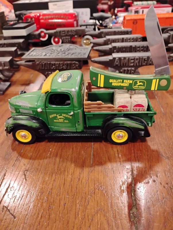 Case Sod Buster Jr Green Synthetic Knife with a John Deere Die Cast Truck used