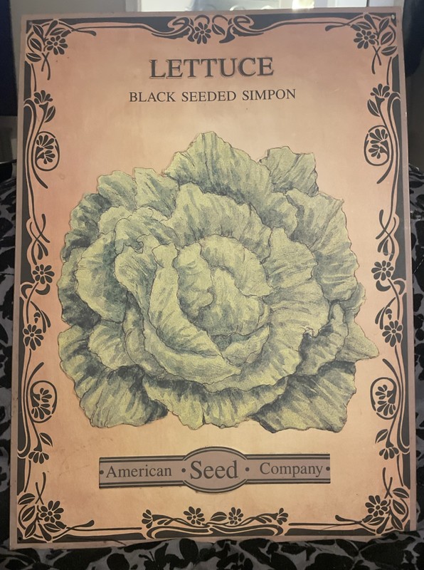 “Lettuce Black Seeded Simpson” American Seed Company vintage-style metal sign.