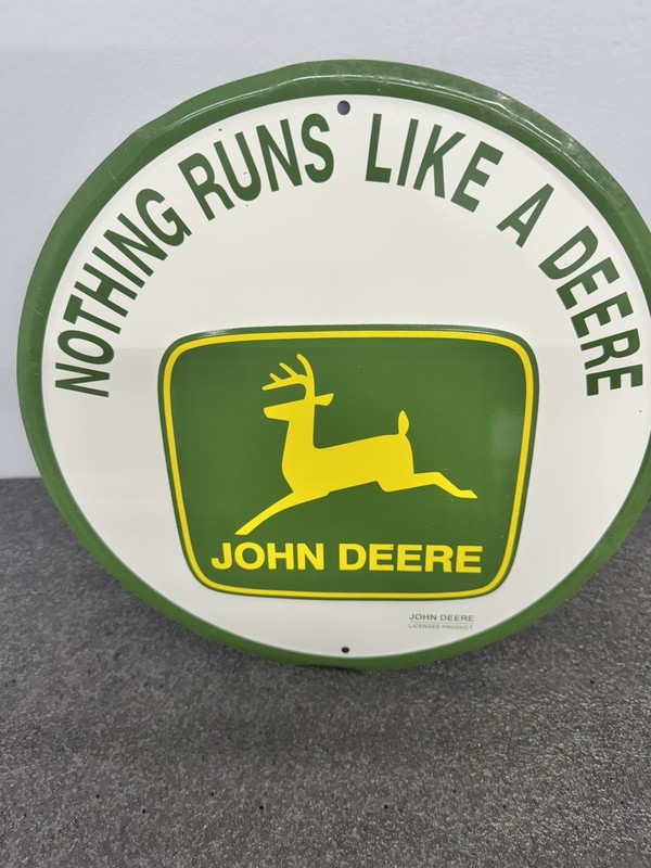 JOHN DEERE Nothing Runs Like A Deere 12 inch Round Metal Sign 1968-2000 logo