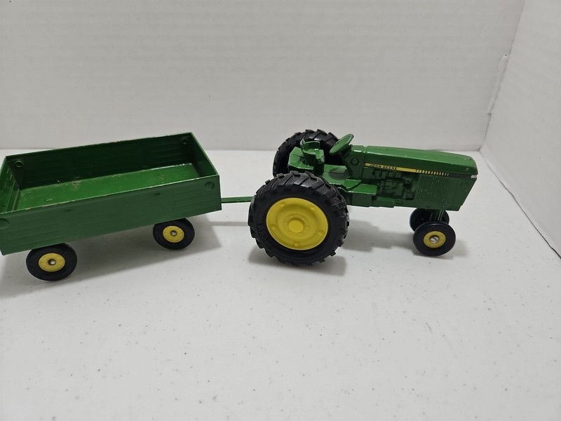 Vintage Ertl John Deere tractor and Lift Gate Wagon