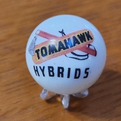 TOMAHAWK HYBIRD CORN SEED ADVERTISING MARBLE 1″ SHOOTER SZ & STAND FARMING FEED
