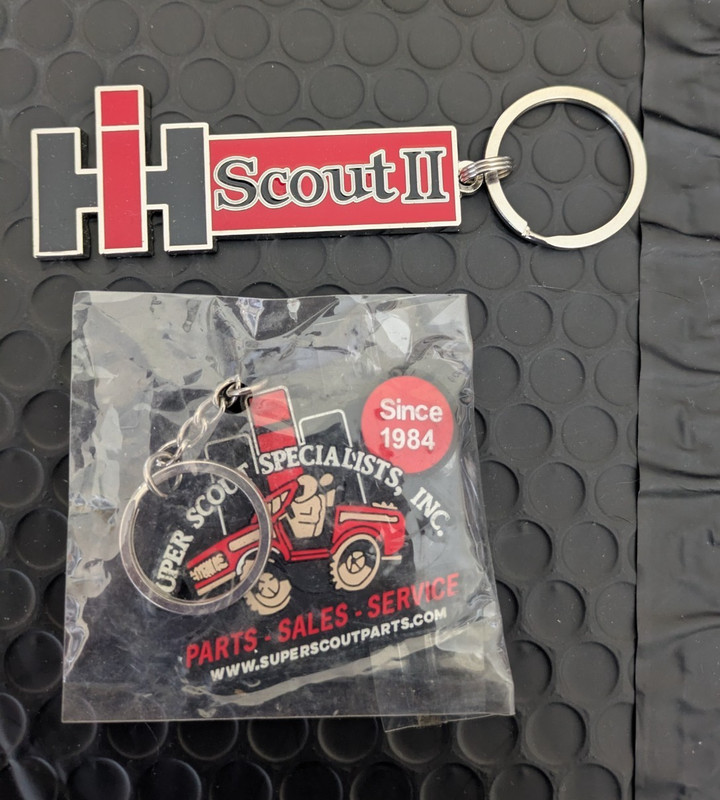 Lot of 2 International Harvester Scout II Keychains One Metal One Rubber