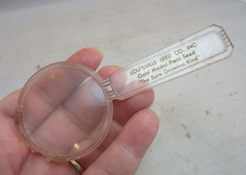 Louisville, KY Seed Co. advertising magnifying glass